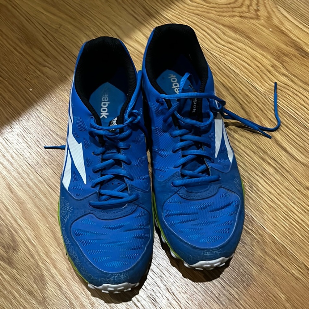 Reebok Realflex running sneakers.